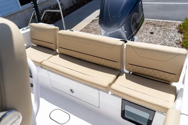 Slide: The Image of 2026 Sportsman Heritage 231 Center Console with beige seating. - 23