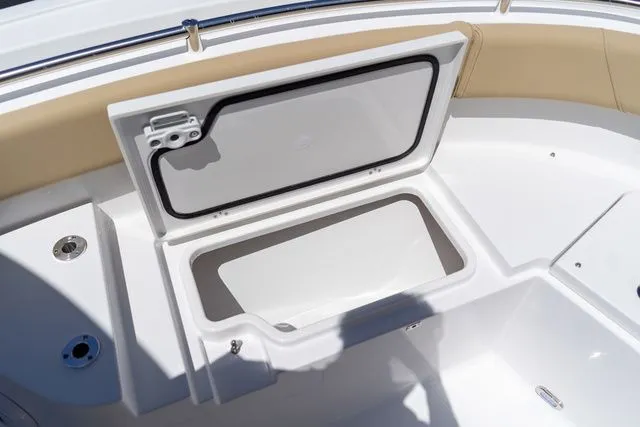 Slide: The Image of Open storage compartment on Sportsman Heritage 231 Center Console 2026. - 35