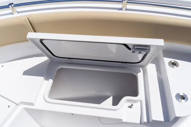 Slide: The Image of Open storage compartment on Sportsman Heritage 231 Center Console 2026. - 37