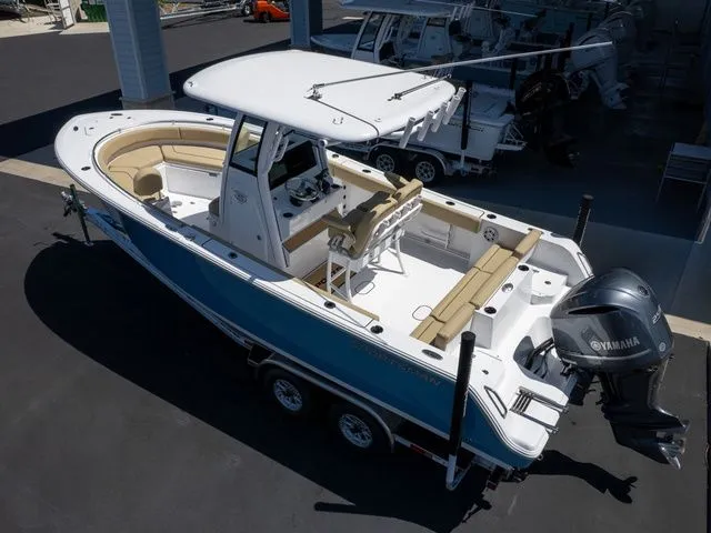 Slide: The Image of 2026 Sportsman Heritage 231 Center Console boat on trailer. - 8