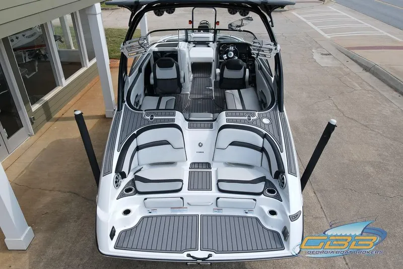Slide: The Image of 2017 Yamaha Boats 242X E-Series, sleek design, spacious seating, and modern features. - 2