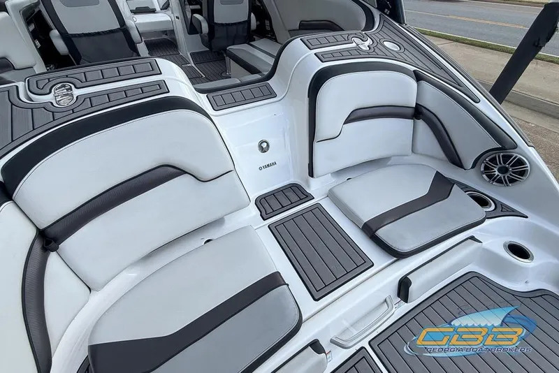 Slide: The Image of 2017 Yamaha Boats 242X E-Series interior with sleek seating and modern design. - 22