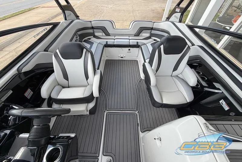 Slide: The Image of 2017 Yamaha Boats 242X E-Series interior with sleek seating and modern design. - 23
