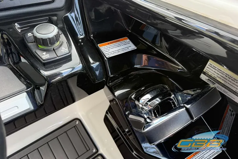 Slide: The Image of Control panel of 2017 Yamaha Boats 242X E-Series with cruise control features. - 26