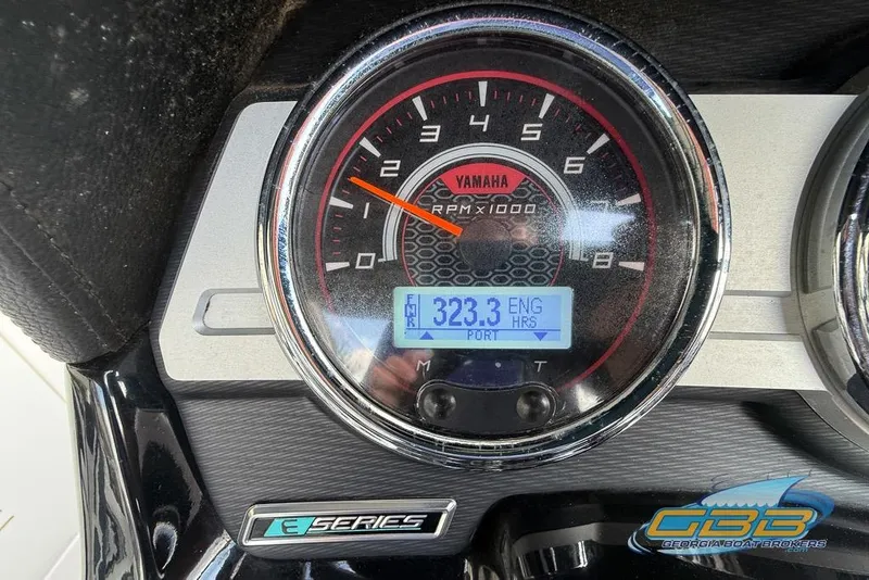 Slide: The Image of Close-up of 2017 Yamaha Boats 242X E-Series tachometer displaying 323.3 engine hours. - 29