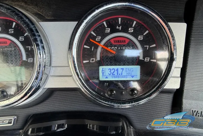Slide: The Image of Close-up of 2017 Yamaha Boats 242X E-Series dashboard gauges displaying engine hours. - 30
