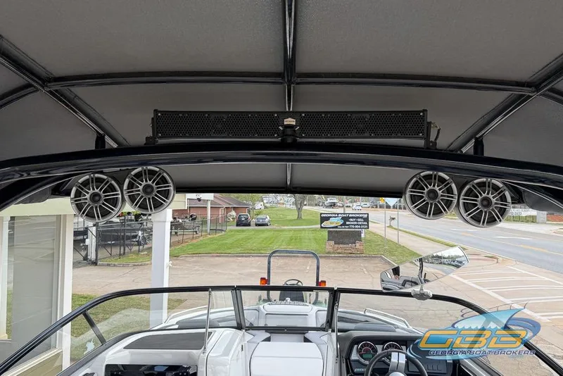 Slide: The Image of 2017 Yamaha Boats 242X E-Series interior with speakers and dashboard view. - 31