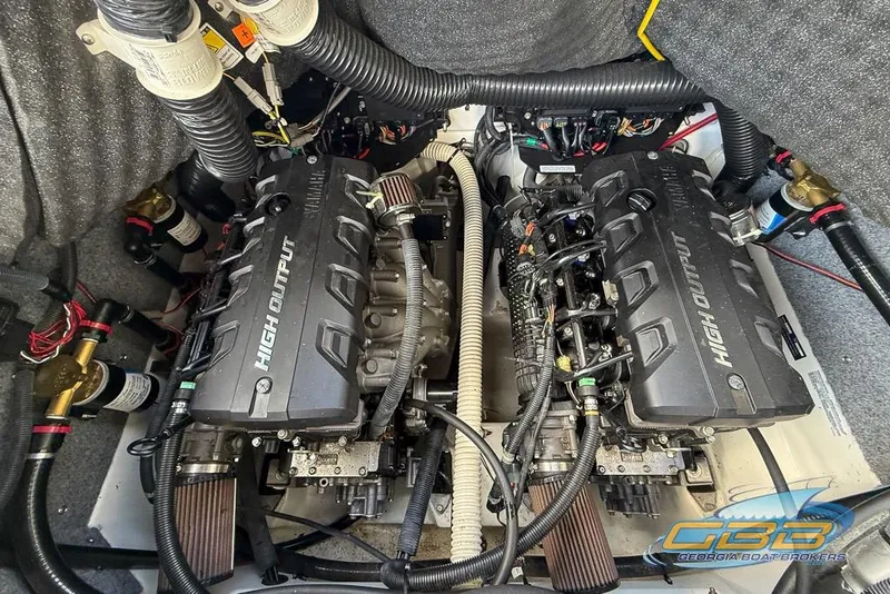 Slide: The Image of 2017 Yamaha Boats 242X E-Series engine compartment with dual high-output engines. - 32