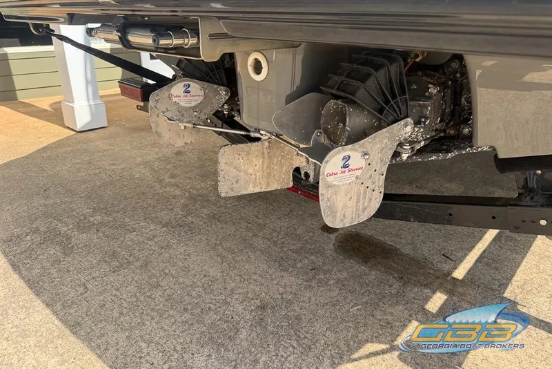 Slide: The Image of Rear view of a 2017 Yamaha Boats 242X E-Series with Cobra Jet Steering. - 38