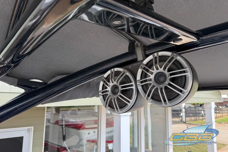 Slide: The Image of Speakers on a 2017 Yamaha Boats 242X E-Series, mounted under a canopy. - 39