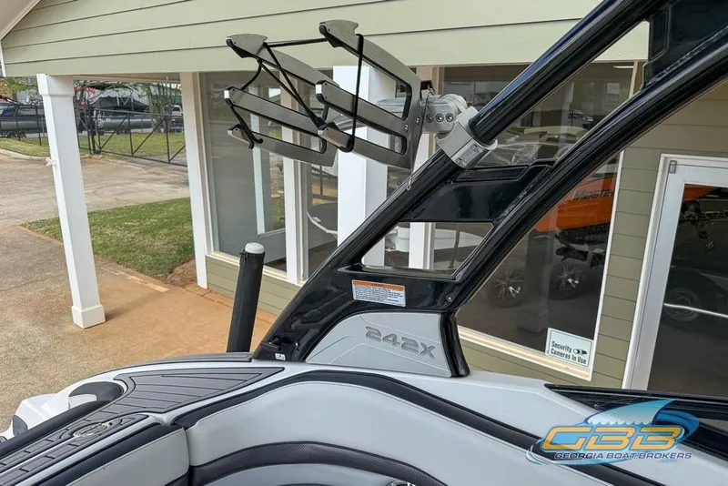 Slide: The Image of 2017 Yamaha Boats 242X E-Series interior with wakeboard rack, showcased by Georgia Boat Brokers. - 40