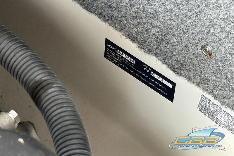 Slide: The Image of 2017 Yamaha Boats 242X E-Series interior detail with model and emission labels. - 46