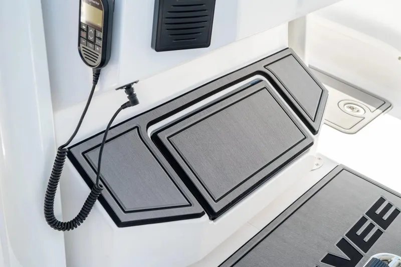 Slide: The Image of Interior view of 2026 Twin Vee 280 GFX2 CC with communication device. - 12