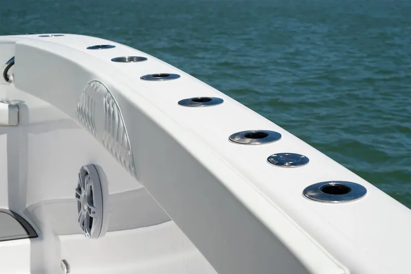 Slide: The Image of Twin Vee 280 GFX2 CC 2026 boat with rod holders on deck. - 19