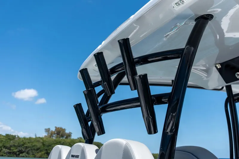 Slide: The Image of Twin Vee 280 GFX2 CC 2026 boat roof with rod holders. - 22