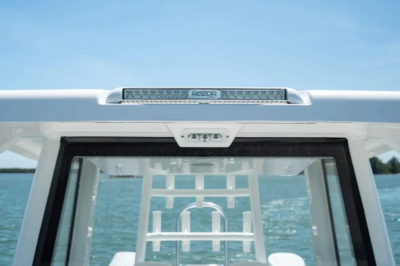 Slide: The Image of 2026 Twin Vee 280 GFX2 CC with LED light bar on water. - 7