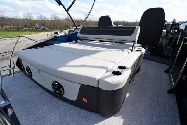 Slide: The Image of 2026 Harris Sunliner 230 boat with spacious seating and cup holders on deck. - 19