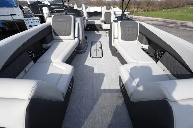Slide: The Image of 2026 Harris Sunliner 230 boat interior with luxurious seating and modern design. - 8