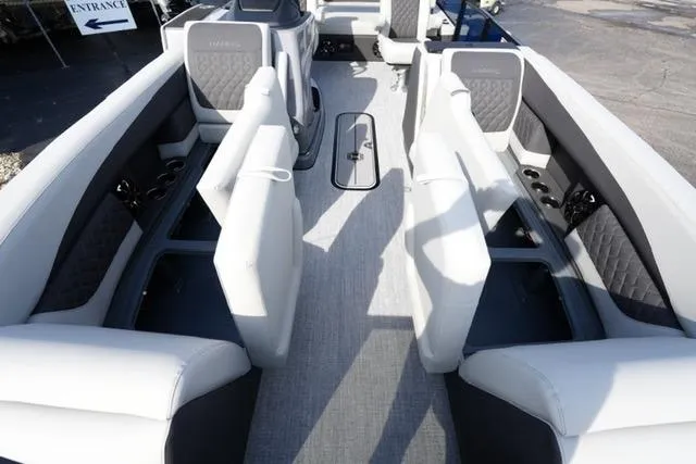 Slide: The Image of 2026 Harris Sunliner 230 boat interior with luxurious seating and modern design. - 9