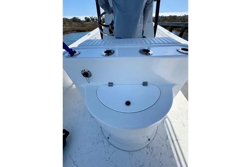 Slide: The Image of 2025 C-Hawk 26 Center Console boat interior with steering console and seating. - 7