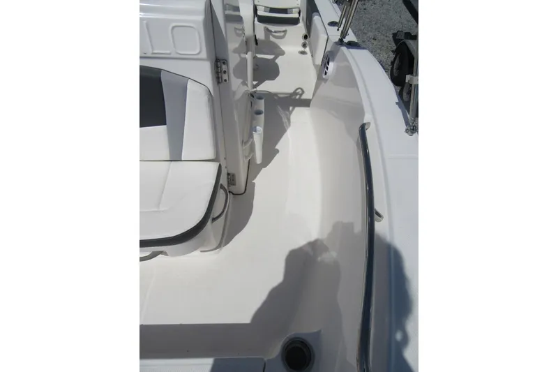 Slide: The Image of 2023 Robalo R180 Center Console boat interior with seating and stainless steel rail. - 10