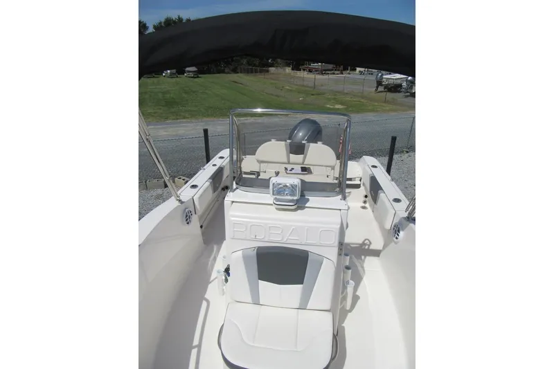Slide: The Image of 2023 Robalo R180 Center Console boat with sleek design and spacious seating. - 9