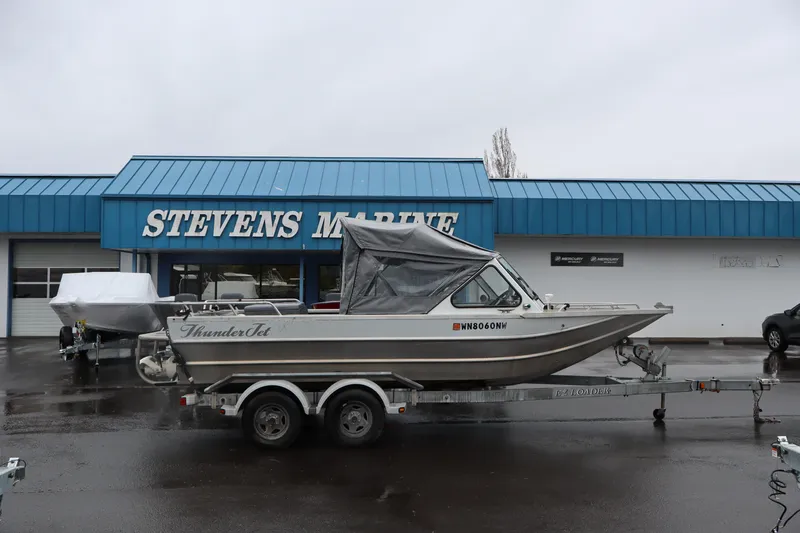 Slide: The Image of 2006 Thunder Jet Luxor 19 boat on trailer at Stevens Marine dealership. - 3