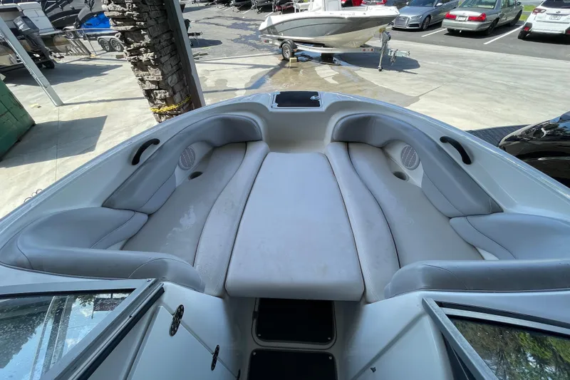 Slide: The Image of 2008 Yamaha Boats AR210 interior with spacious seating and sleek design. - 4