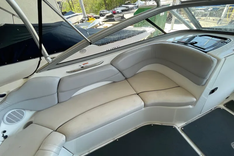 Slide: The Image of 2008 Yamaha Boats AR210 interior with gray seating and sleek design. - 8