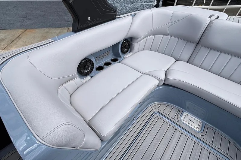 Slide: The Image of Luxurious seating in 2026 MB B52 23 Classic boat with speakers and cup holders. - 14