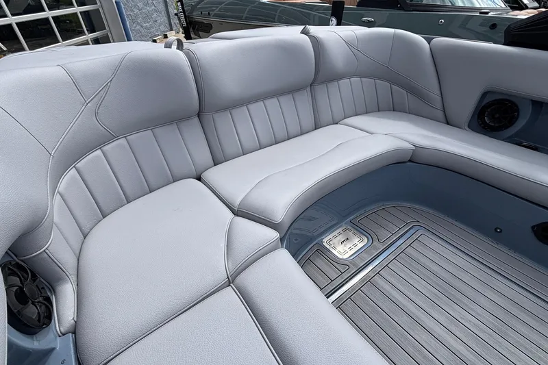 Slide: The Image of Luxurious seating in 2026 MB B52 23 Classic boat, featuring sleek gray upholstery. - 16