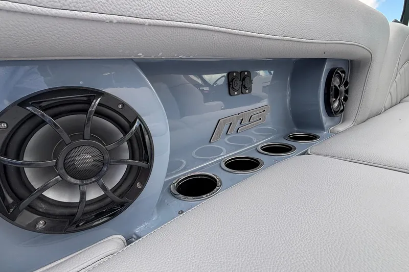 Slide: The Image of 2026 MB B52 23 Classic interior with speakers and cup holders. - 18