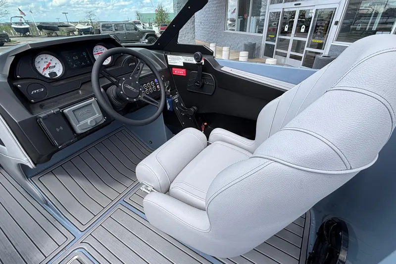 Slide: The Image of Interior of 2026 MB B52 23 Classic boat with steering wheel and dashboard controls. - 21