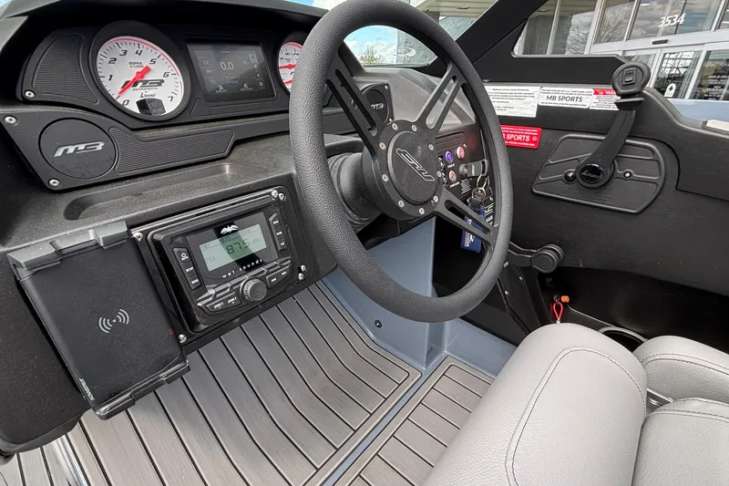 Slide: The Image of 2026 MB B52 23 Classic boat dashboard with steering wheel and control panel. - 22