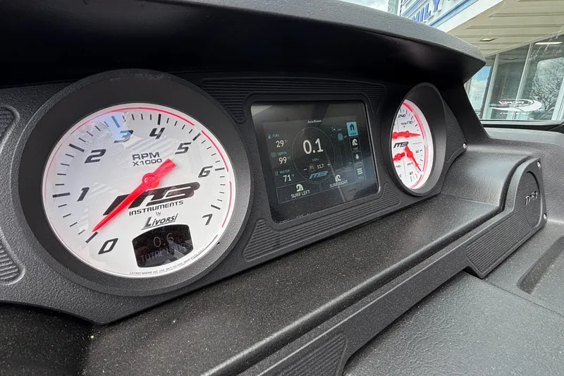 Slide: The Image of Dashboard of 2026 MB B52 23 Classic with RPM gauge and digital display. - 24