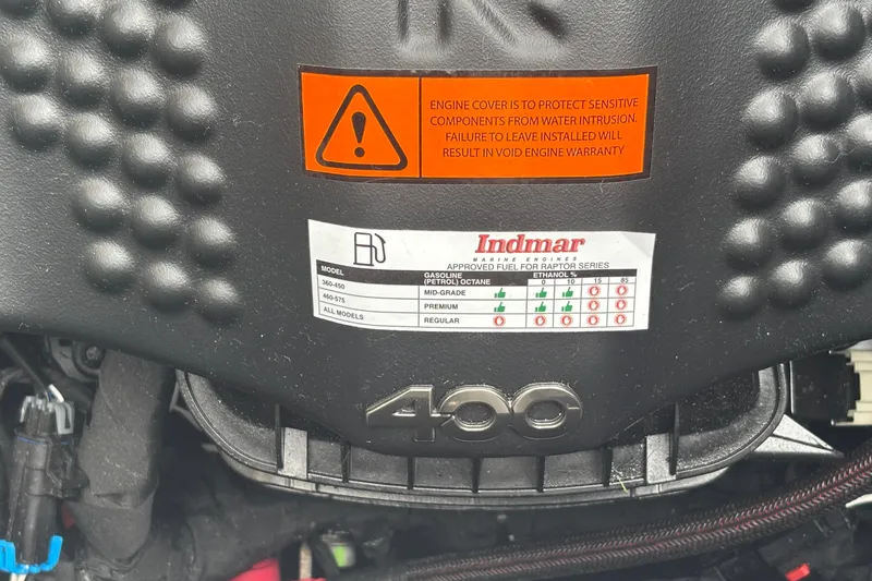 Slide: The Image of Engine cover of 2026 MB B52 23 Classic with fuel specifications and warning label. - 29