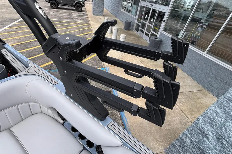 Slide: The Image of Boat accessory on MB B52 23 Classic, 2026 model, parked near a building entrance. - 32