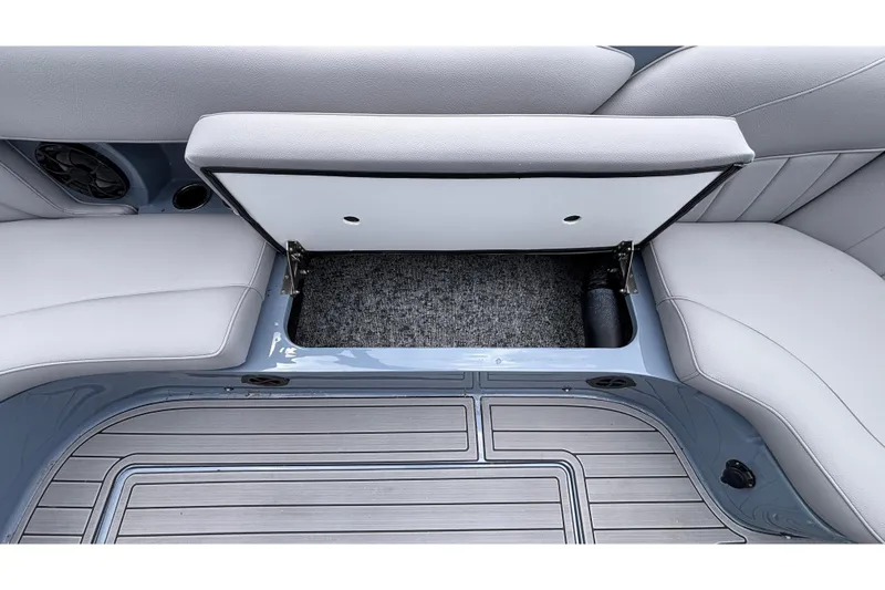 Slide: The Image of 2026 MB B52 23 Classic boat interior storage compartment with open lid, showcasing spacious design. - 37