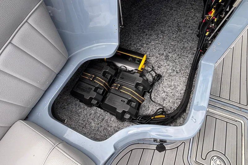 Slide: The Image of Interior of 2026 MB B52 23 Classic showing battery compartment and wiring. - 39