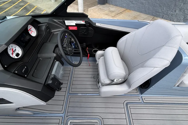 Slide: The Image of Interior of 2026 MB B52 23 Classic boat with modern dashboard and seating. - 40