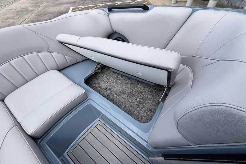 Slide: The Image of 2026 MB B52 23 Classic boat interior with gray seating and storage compartment. - 51