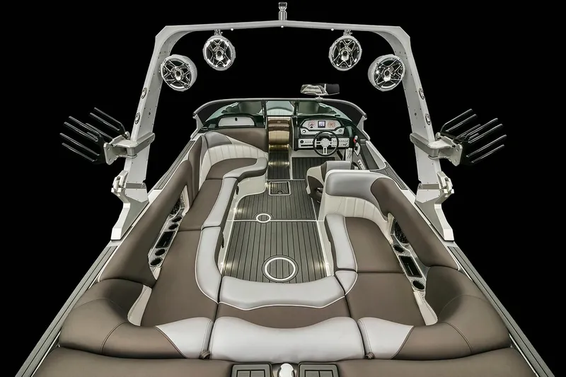 Slide: The Image of 2026 MB B52 23 Classic boat, rear view, docked under a partly cloudy sky. - 8