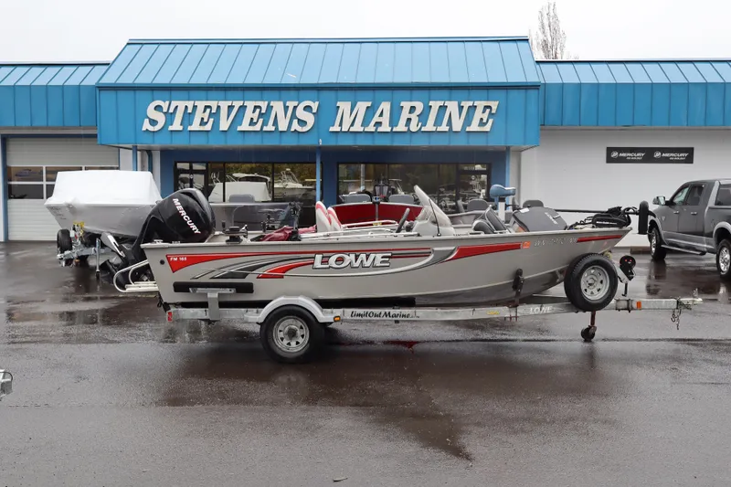 The Image of 2009 Lowe Fishing Machine 165 boat at Stevens Marine dealership. - 1