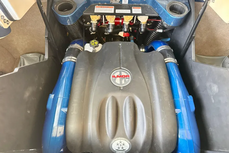 Slide: The Image of Engine compartment of a 2022 MasterCraft X24 boat featuring an Ilmor engine. - 32
