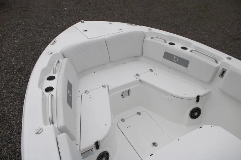 Slide: The Image of 2026 Sea Fox 268 Commander boat interior with cushioned seating and storage compartments. - 10