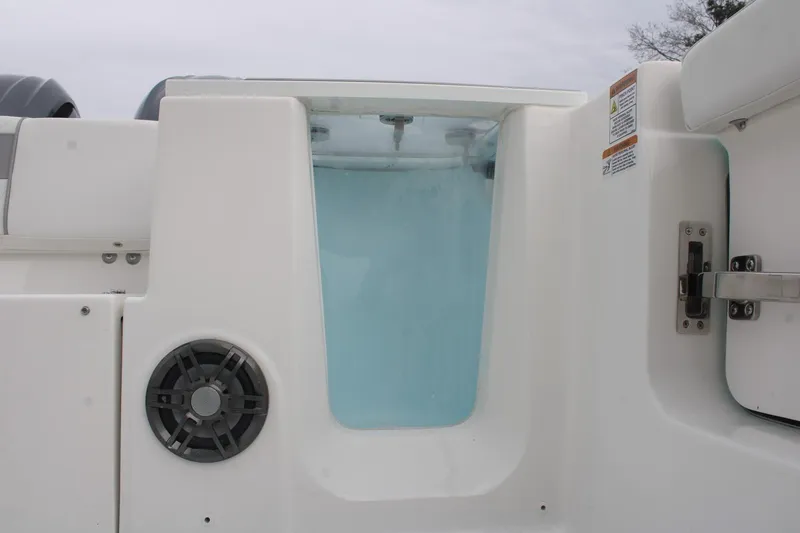 Slide: The Image of 2026 Sea Fox 268 Commander boat interior with speaker and water compartment. - 15