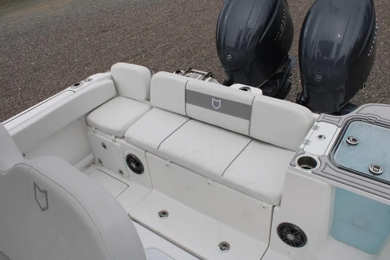Slide: The Image of 2026 Sea Fox 268 Commander boat interior with seating and dual engines. - 17