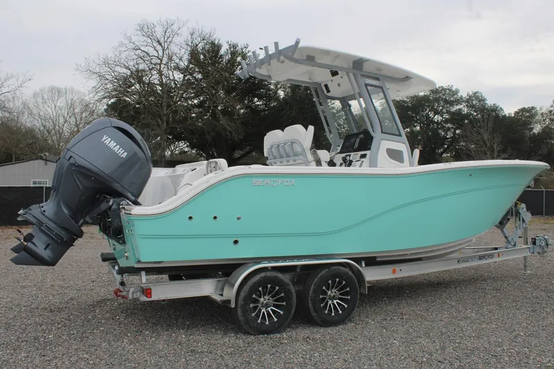 Slide: The Image of 2026 Sea Fox 268 Commander boat on trailer with Yamaha engine. - 2