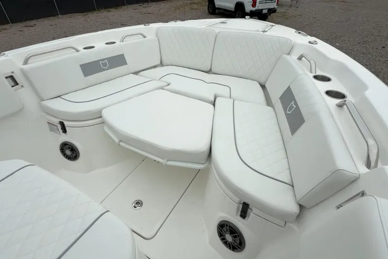 Slide: The Image of Luxurious seating area on 2026 Sea Fox 268 Commander boat with white cushioned seats. - 8