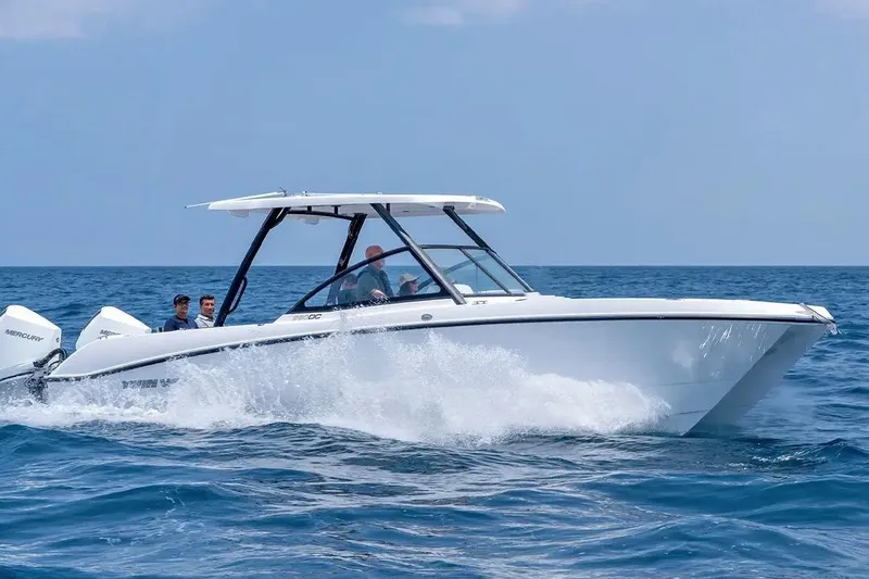 The Image of Manufacturer Provided Image: 2026 Twin Vee 280 GFX2 DC boat cruising on open water, showcasing sleek design and performance. - 0